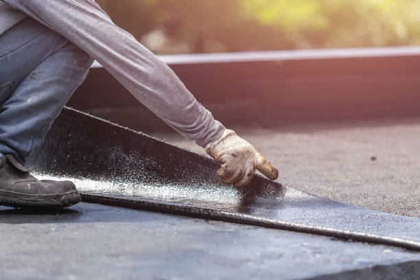 Professional Basement Waterproofing technician working in Albion, IL
